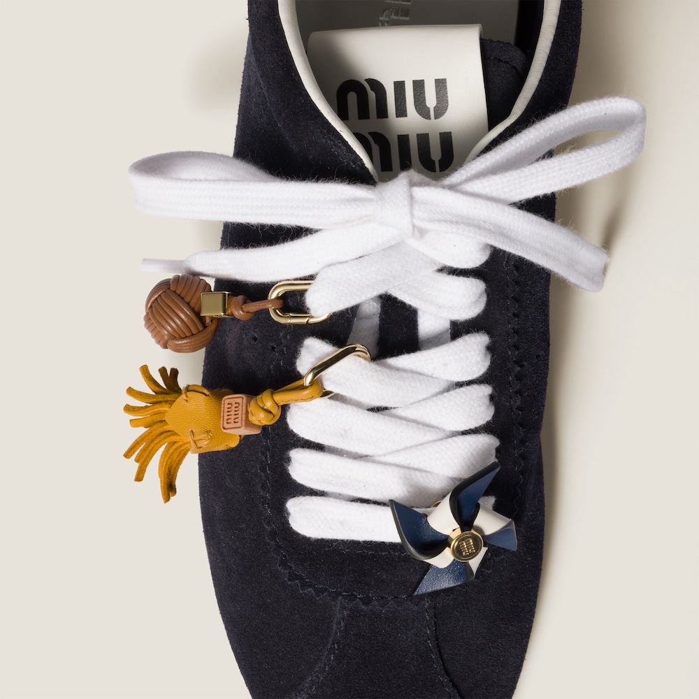 Leather pinwheel brooch