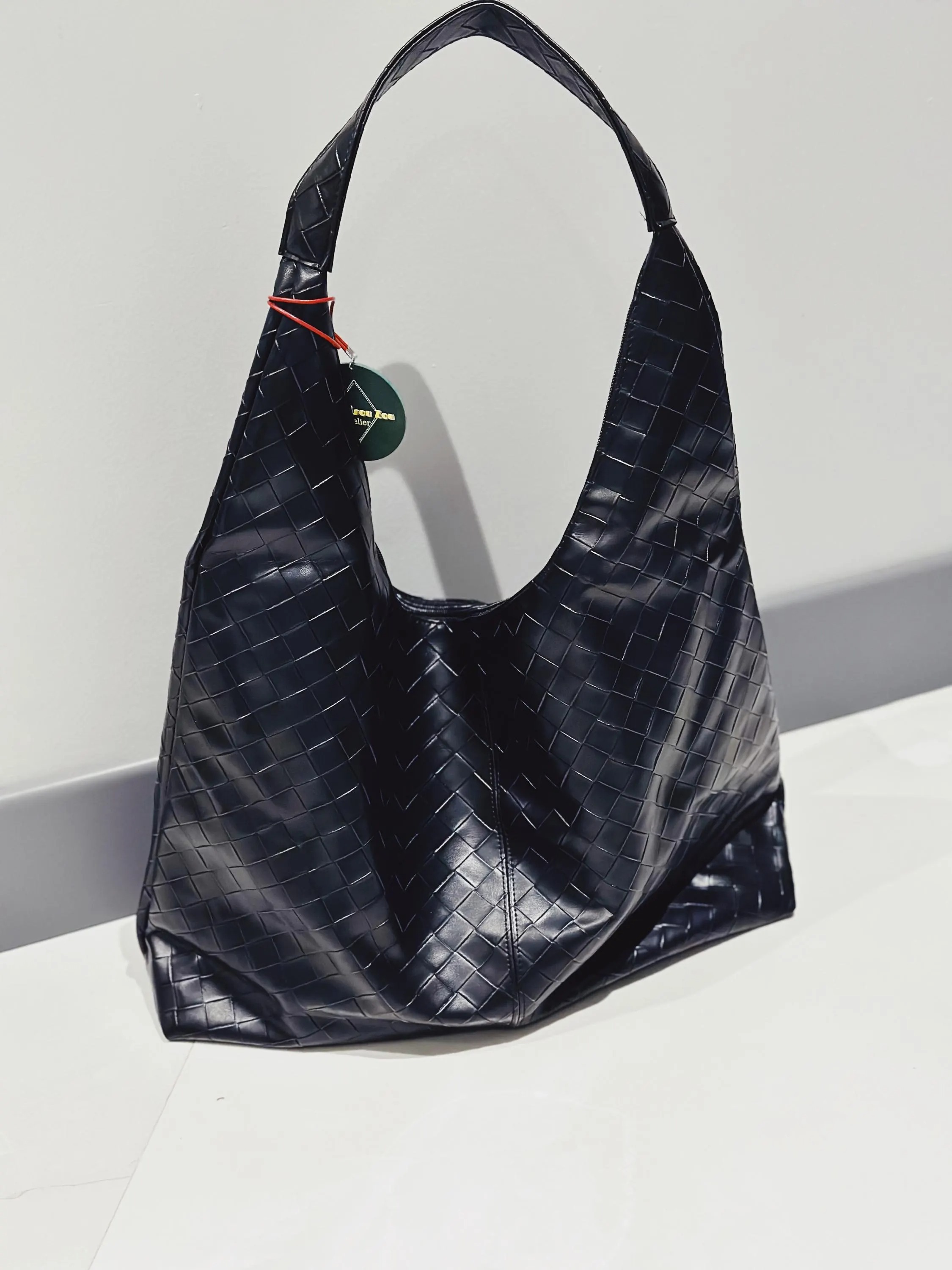 The Intreccio Woven Leather Hobo Bag
