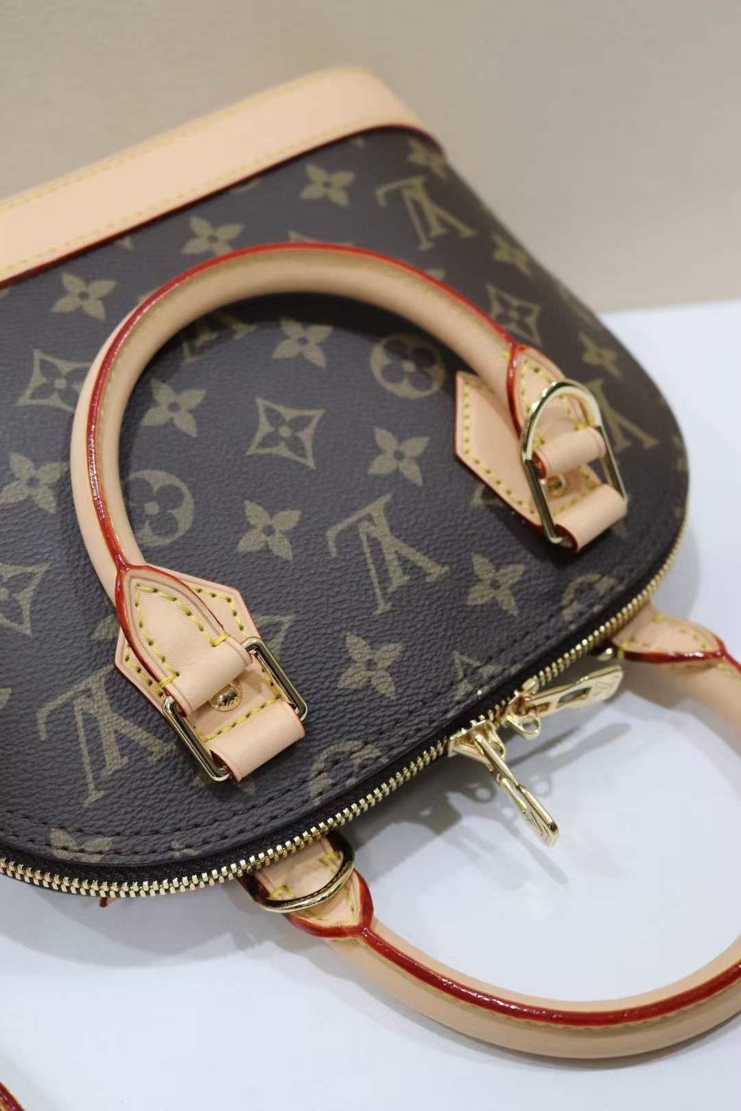Louis Vuitton Alma Bag