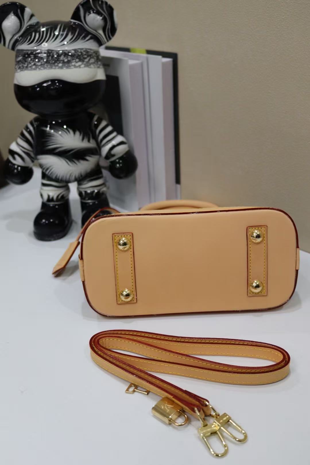 Louis Vuitton Alma Bag