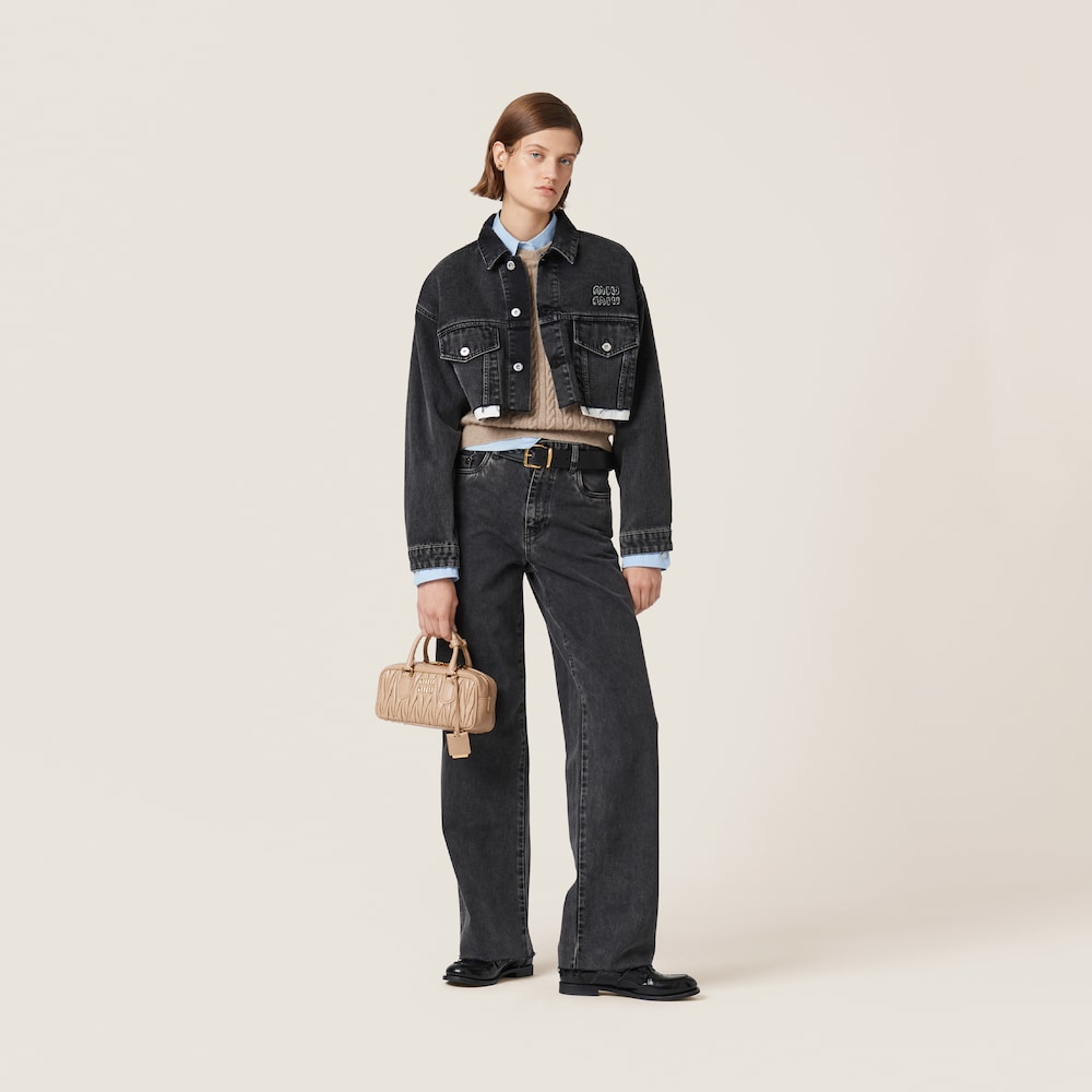 Five-pocket black denim jeans