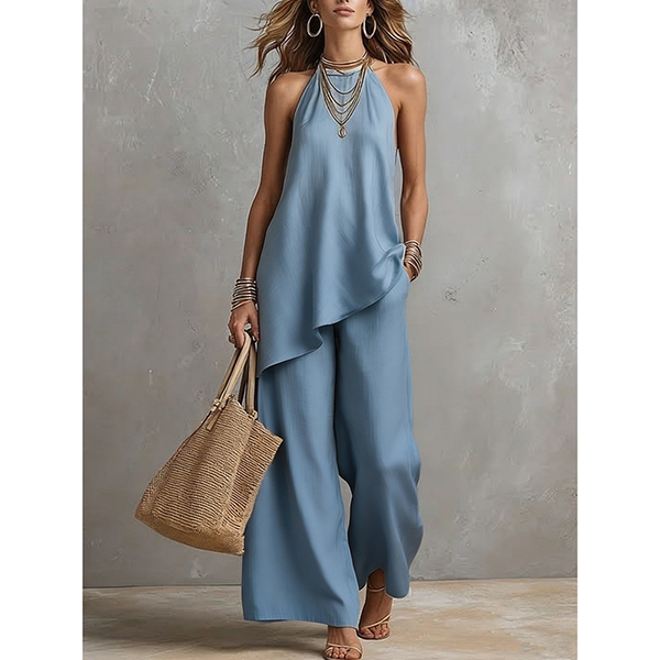 HALTERTOP MET ASYMMETRISCHE ZOOM EN BROEK MET WIJDE PIJPEN