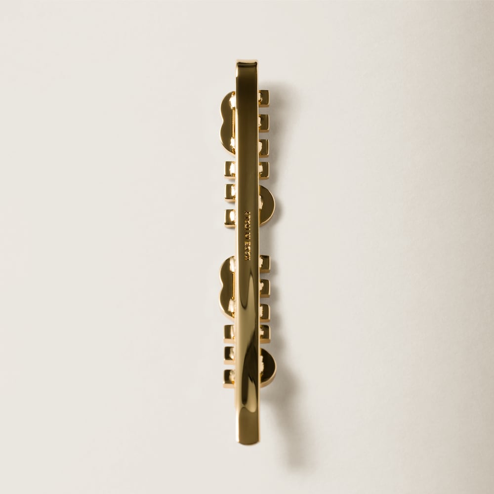 Enameled metal hair clip