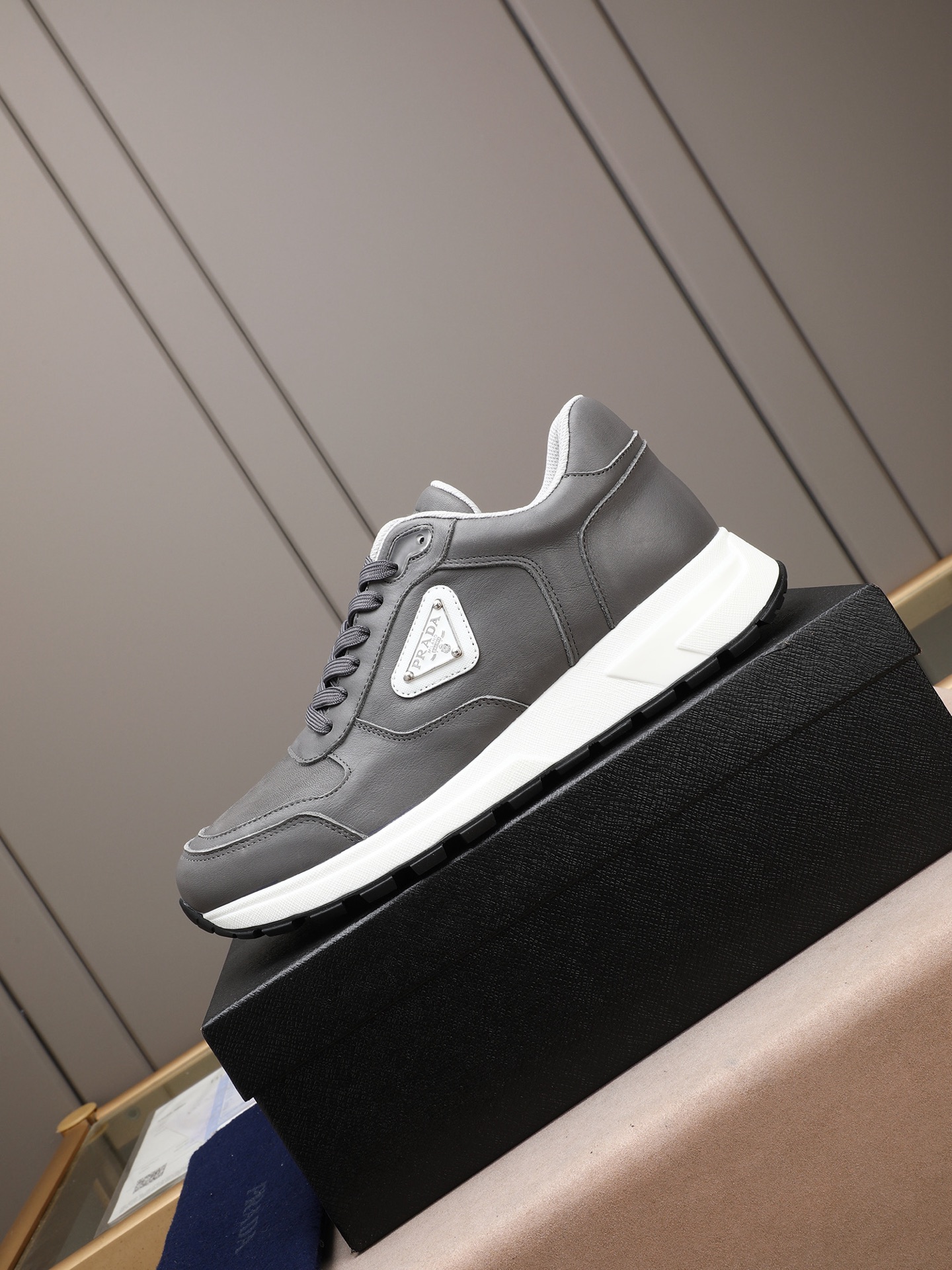 Prada Triangle Logo