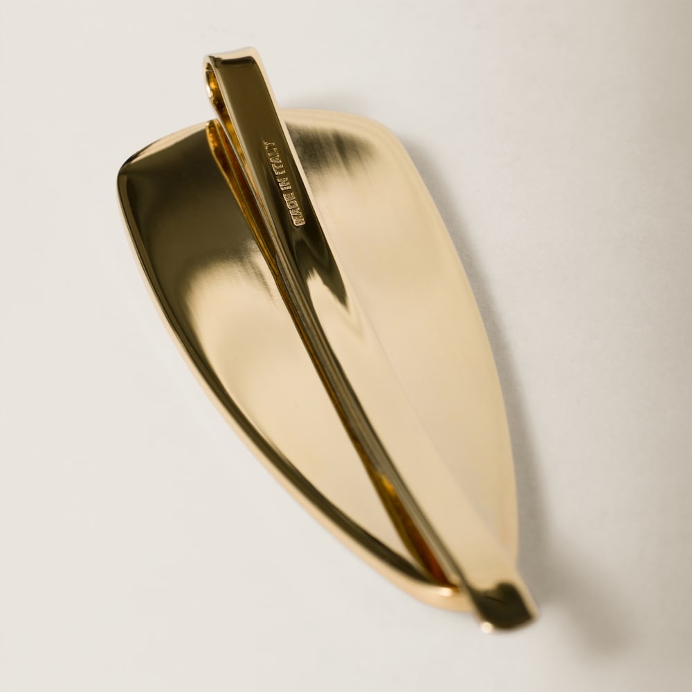 Enameled metal hair clip