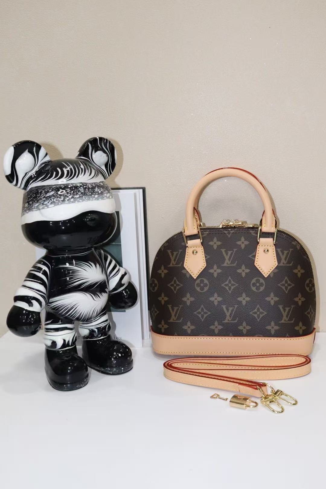 Louis Vuitton Alma Bag