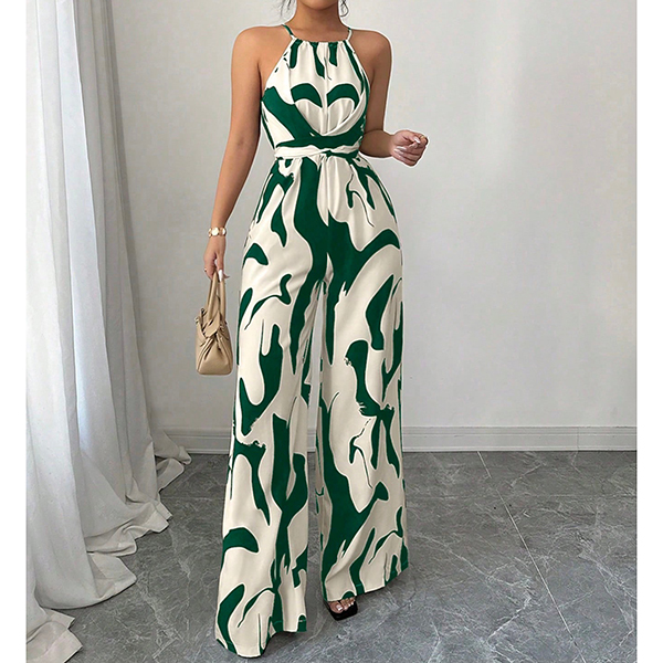 HALTERNECK EN KOEIENPRINT JUMPSUIT