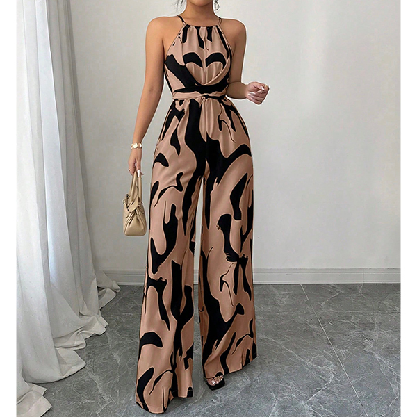 HALTERNECK EN KOEIENPRINT JUMPSUIT