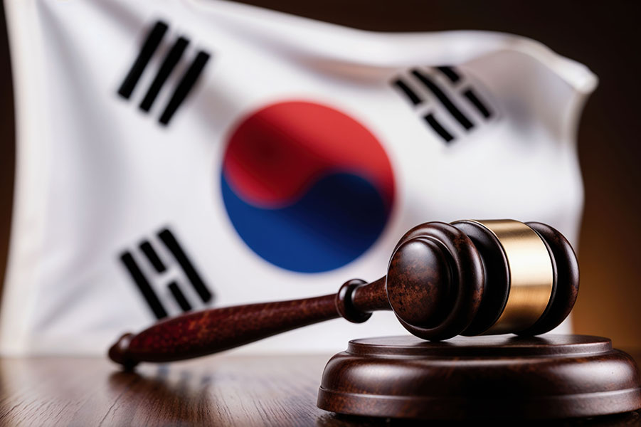 Electronic cigarette devices and vape pods displayed alongside traditional cigarettes, representing South Korea’s new law classifying vaping products as cigarettes from April 24.