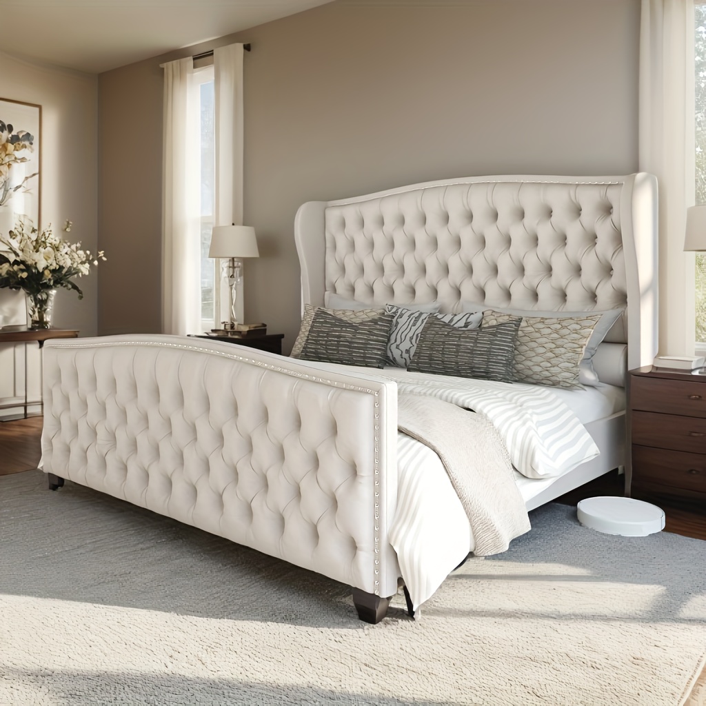 Handmade velvet bed frame with wing-style headboard, decorated with buttons and stud detailing, supporting wooden bed slats.