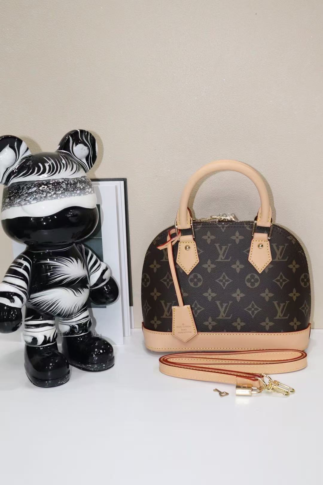 Louis Vuitton Alma Bag