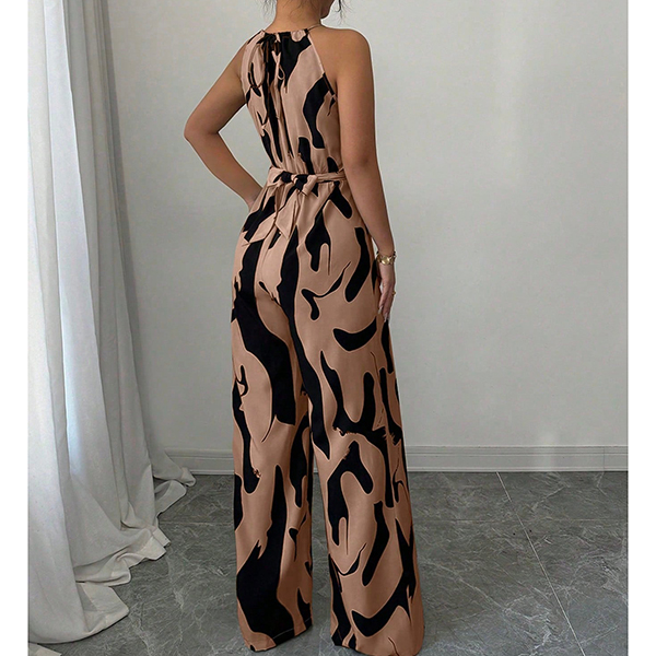 HALTERNECK EN KOEIENPRINT JUMPSUIT