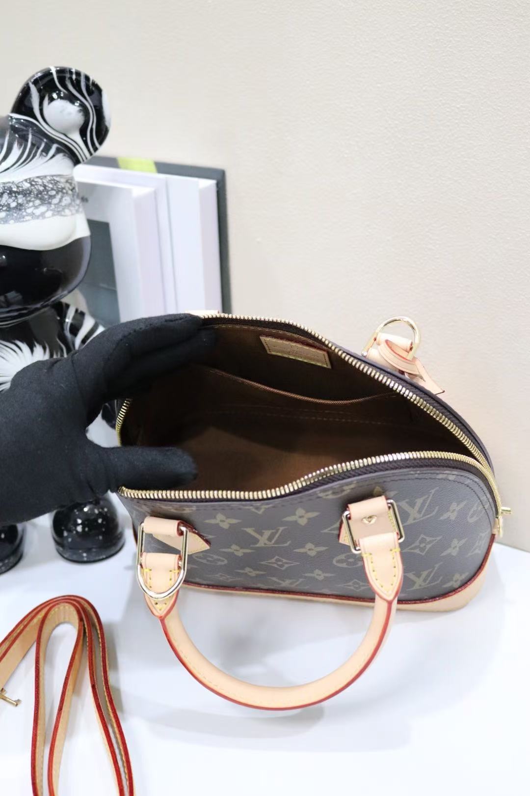 Louis Vuitton Alma Bag