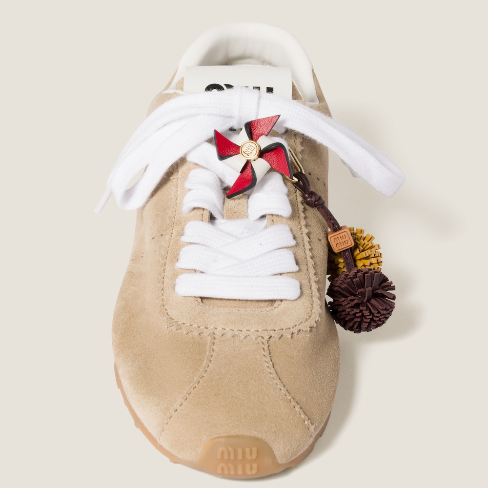 Leather pinwheel brooch