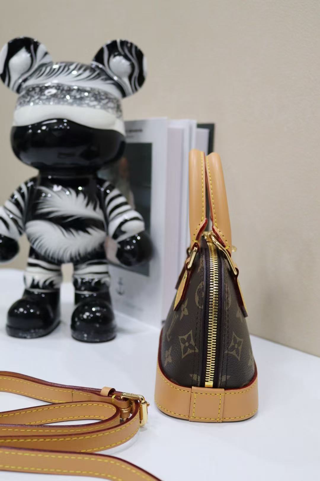 Louis Vuitton Alma Bag