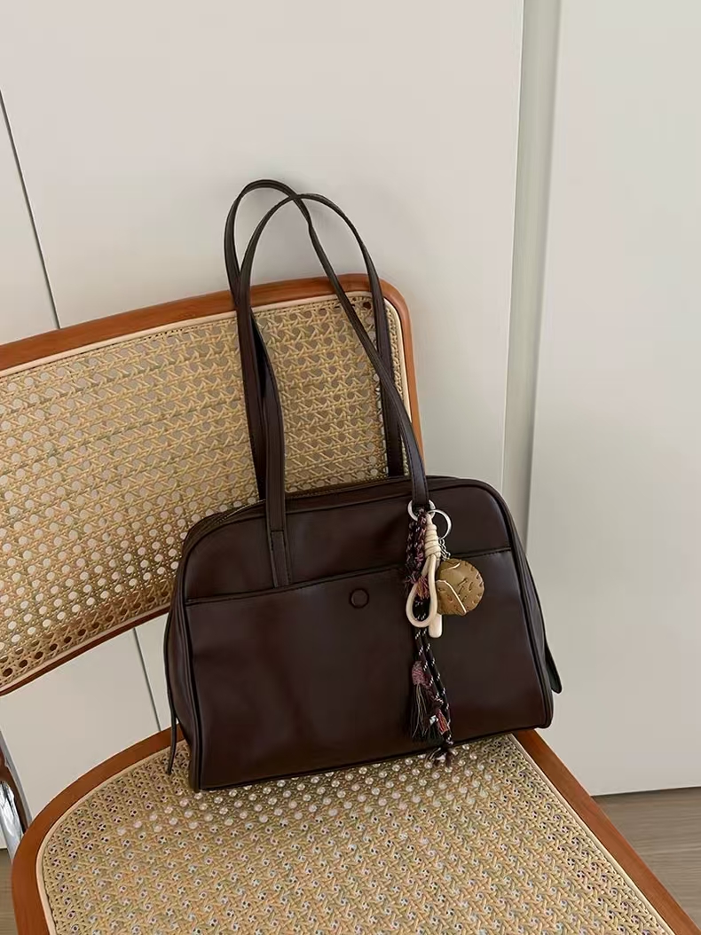 Korean version new pillow-shaped handbag for women, 2025 new vintage crossbody bag for work and commuting, large capacity tote bag