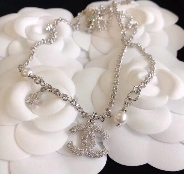 Chanel Double c half diamond necklace sliver