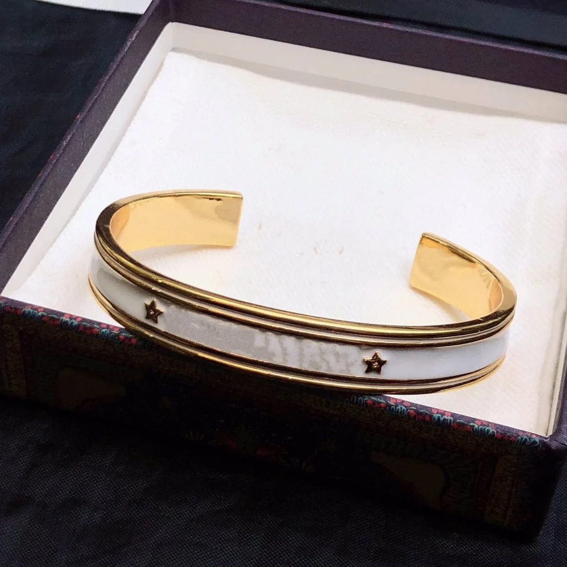 [CD]CODE BANGLE GOLD WHITE METAL AND LACQUER BRACELET