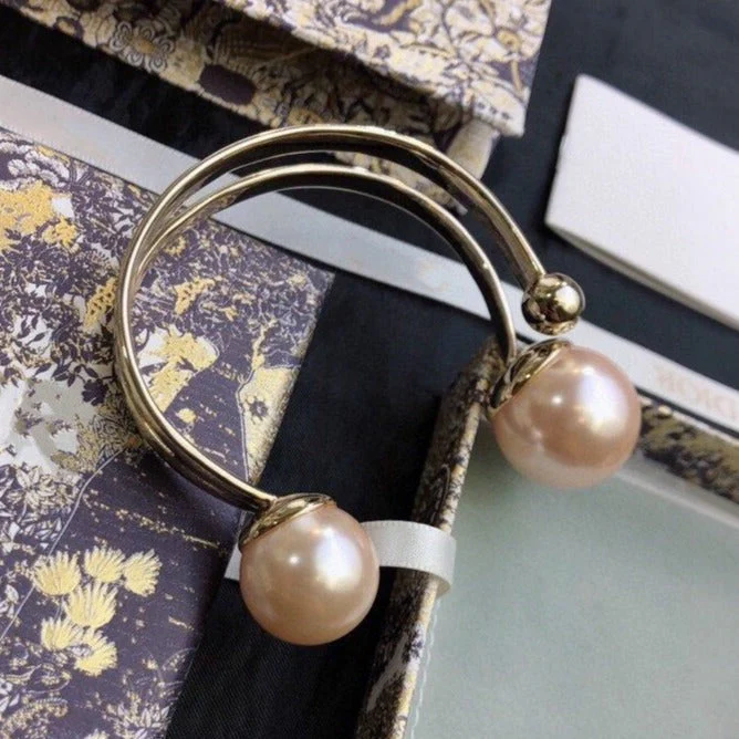 [CD]DIO TRIBALES BANGLE GOLD AND PEARL PINK BRACELET