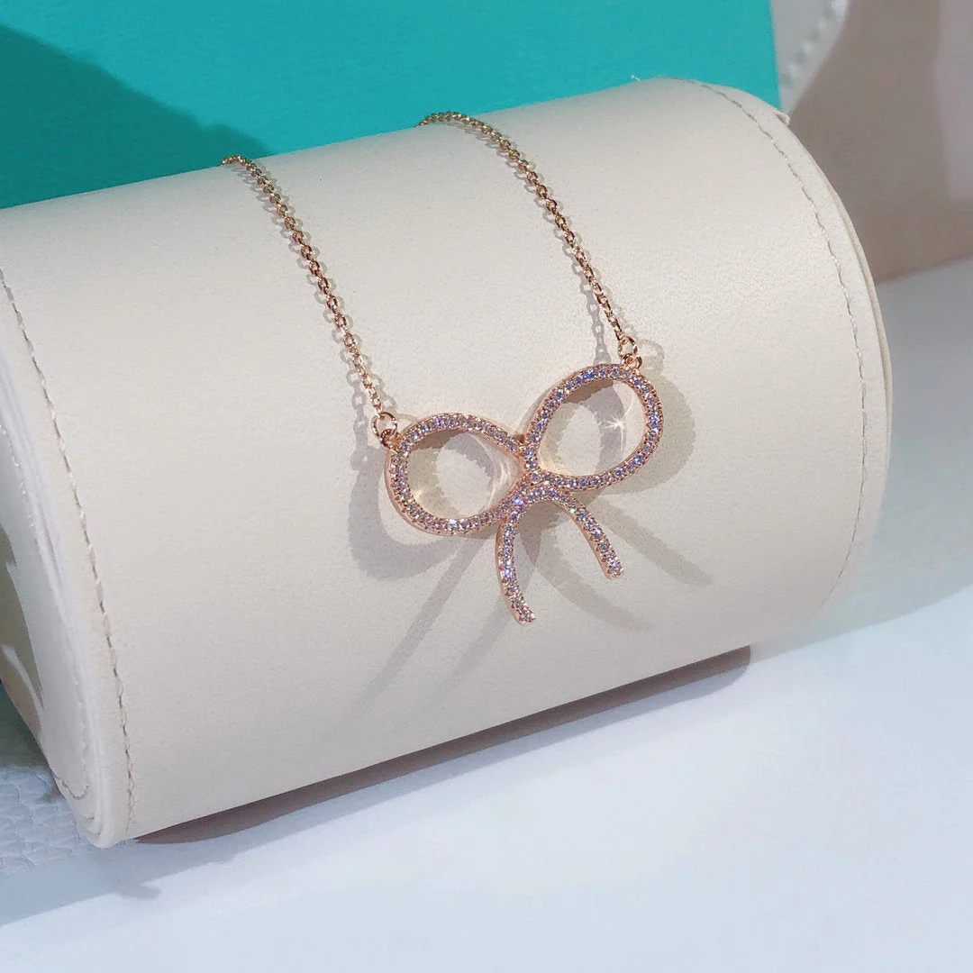 [TF]CLAW SET RHODIUM PLATED BOW NECKLACE