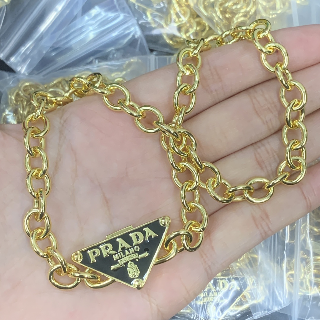 P design triangle logo necklace