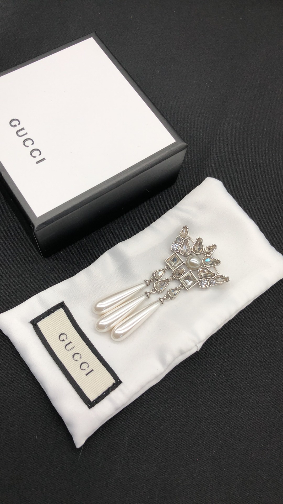 G design diamond brooch