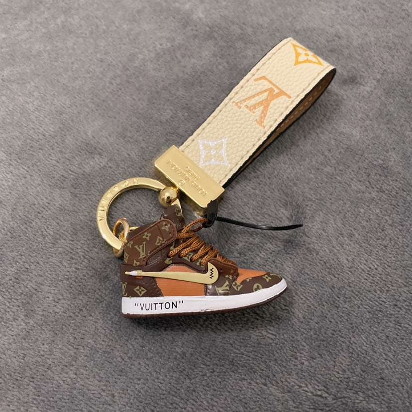 L designkey chain + Nike shoe pendant