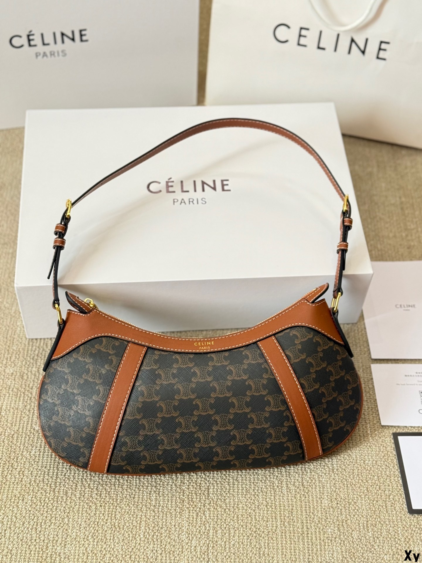 C Design's latest niche printed striped HOBO handbag