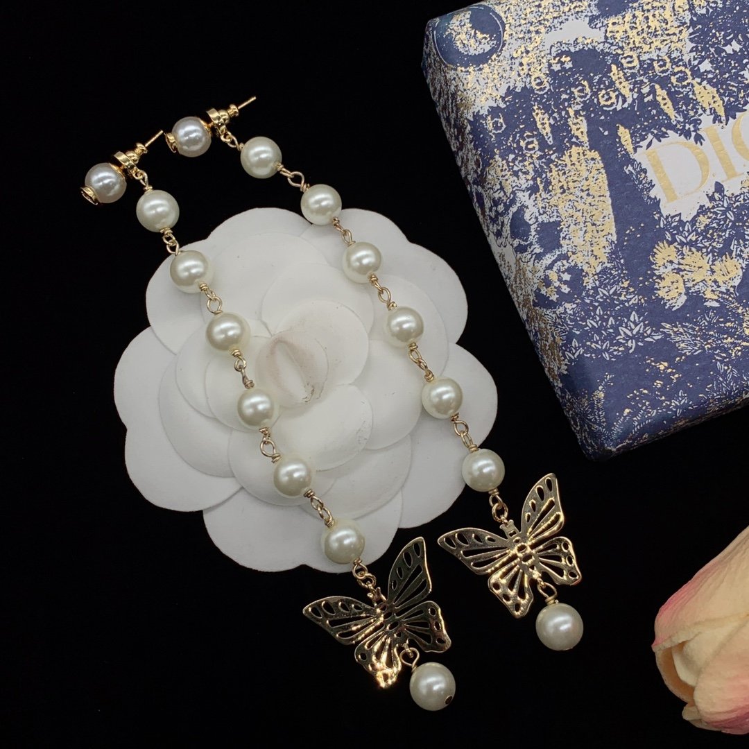 D designFashion Pearl Bow Earrings