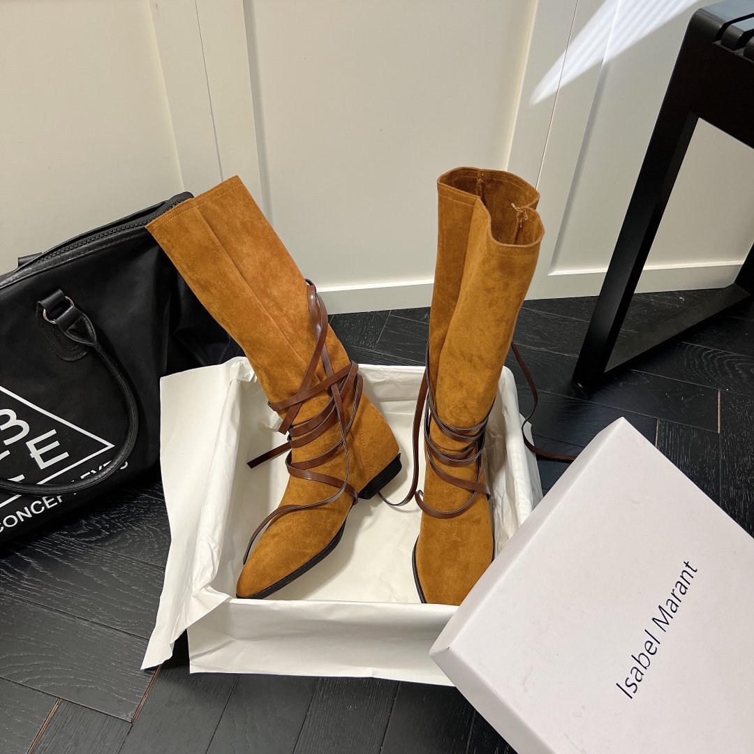 Isabel Marant strips style high knee boots