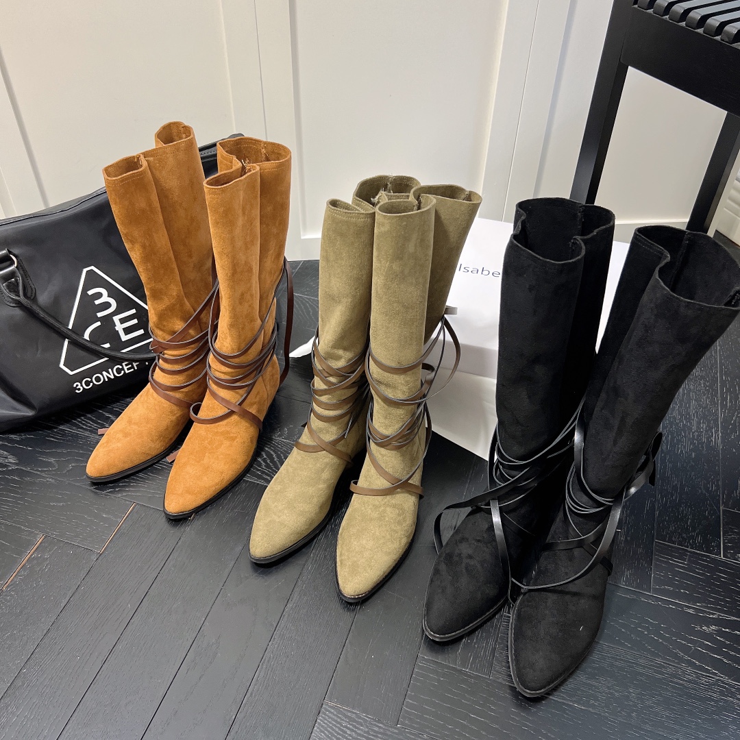 Isabel Marant strips style high knee boots
