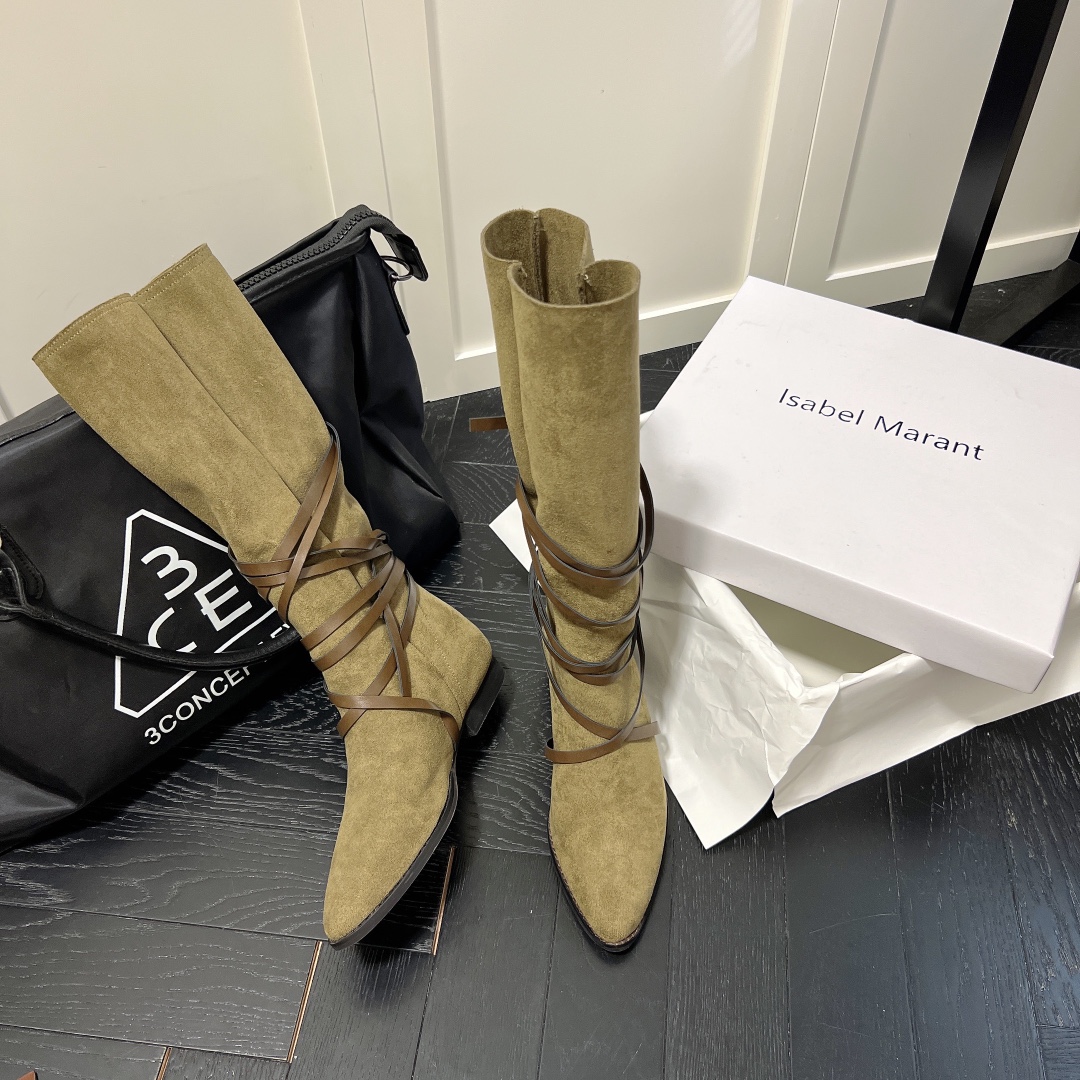 Isabel Marant strips style high knee boots