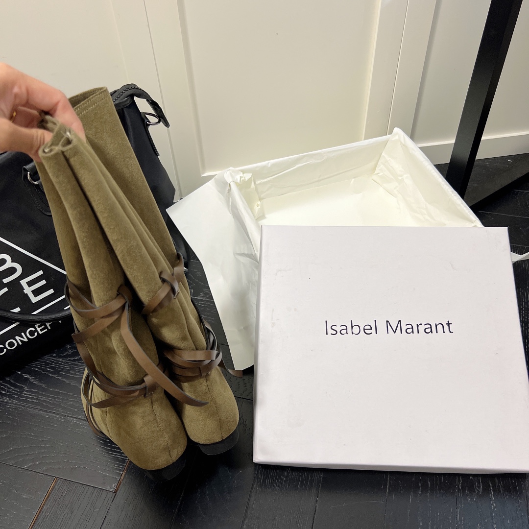 Isabel Marant strips style high knee boots