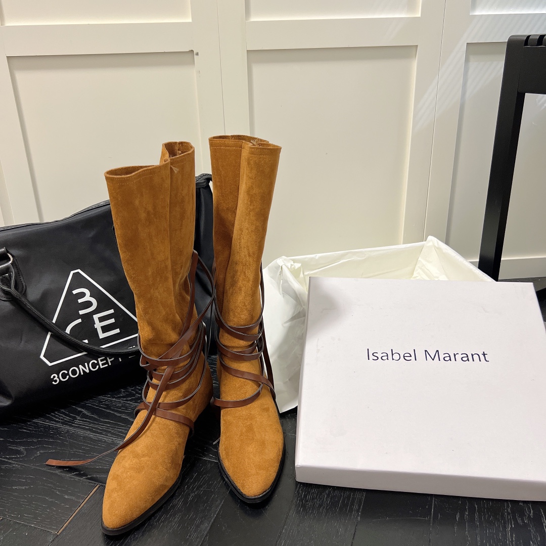Isabel Marant strips style high knee boots