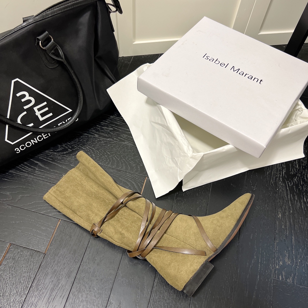 Isabel Marant strips style high knee boots