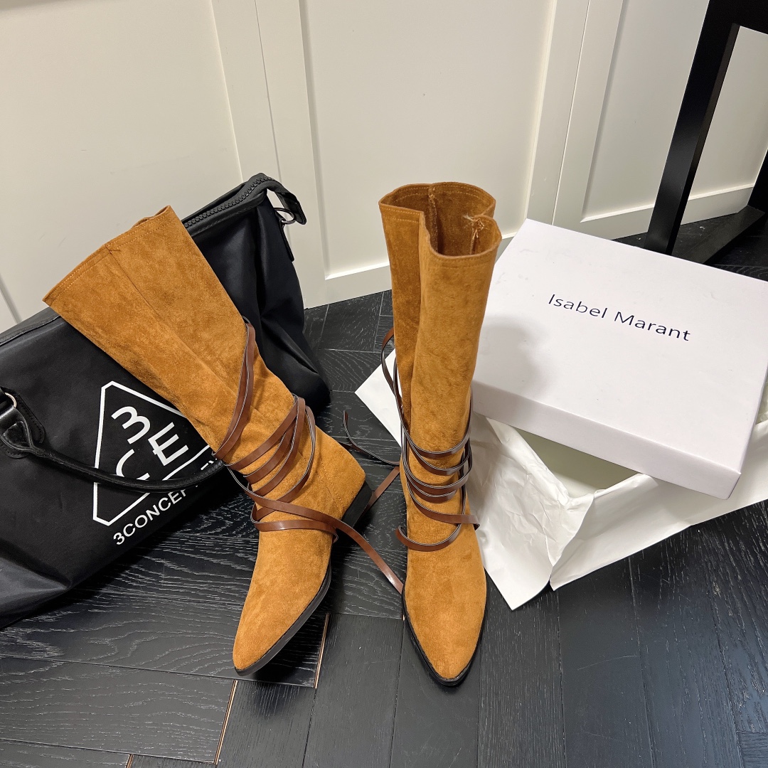 Isabel Marant strips style high knee boots