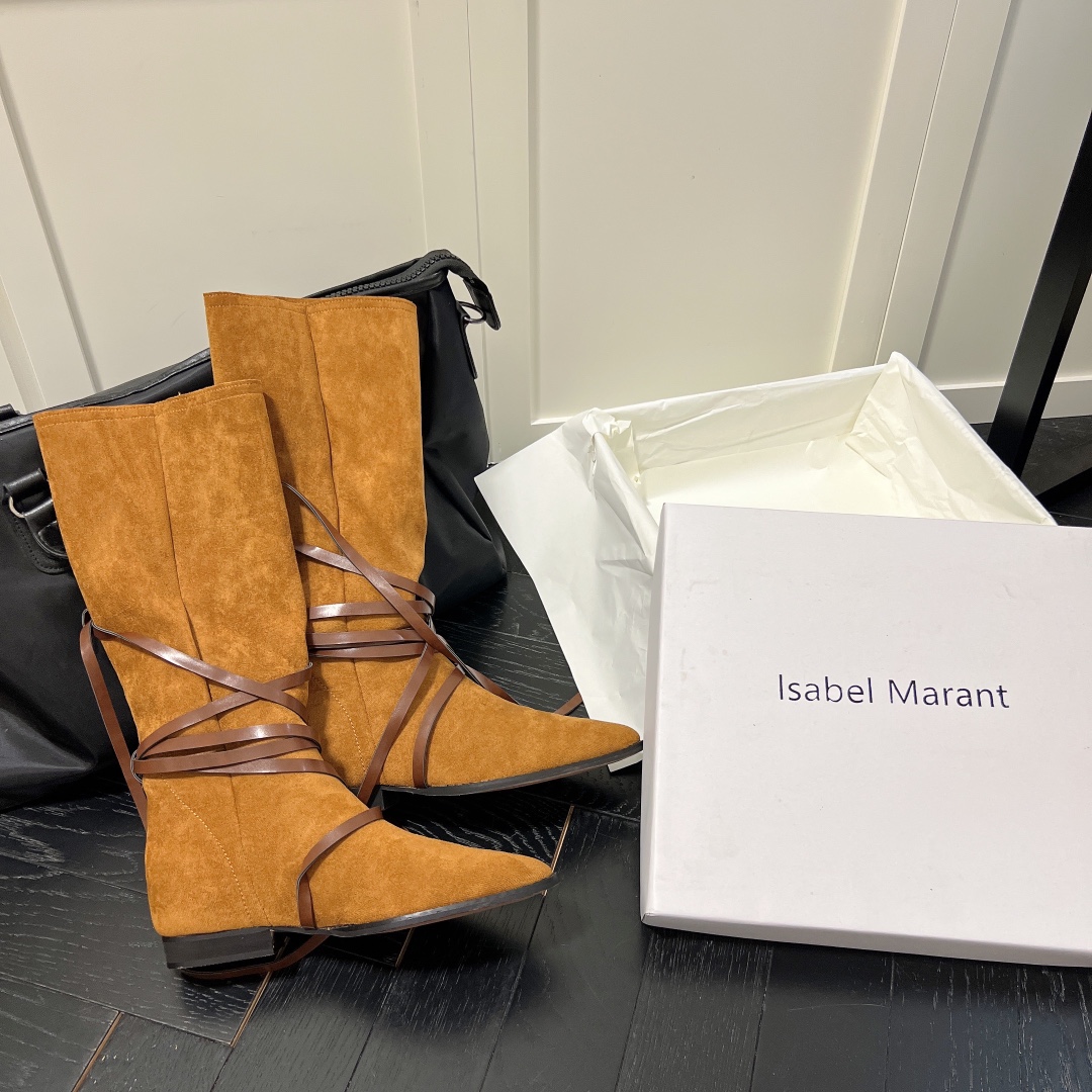 Isabel Marant strips style high knee boots