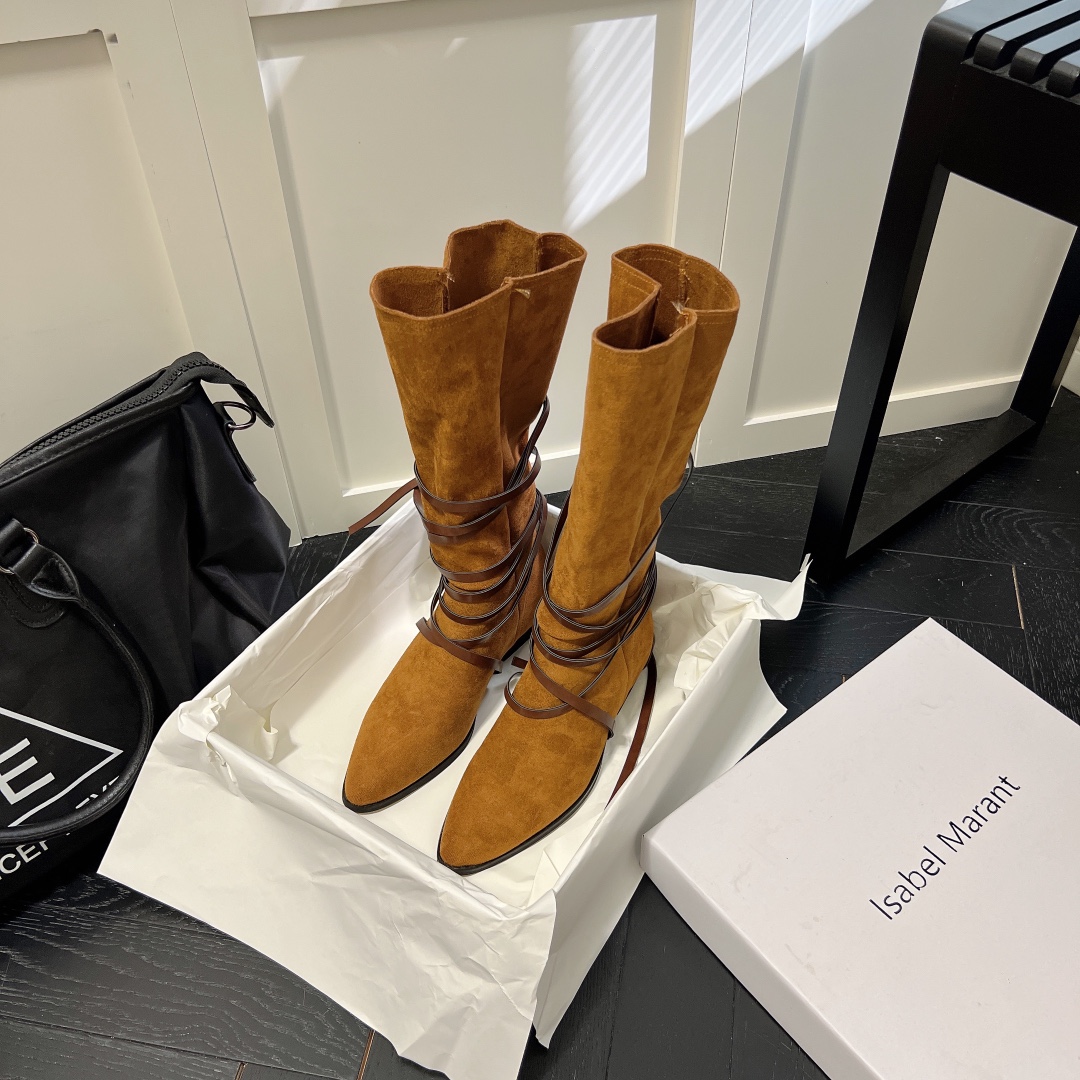 Isabel Marant strips style high knee boots