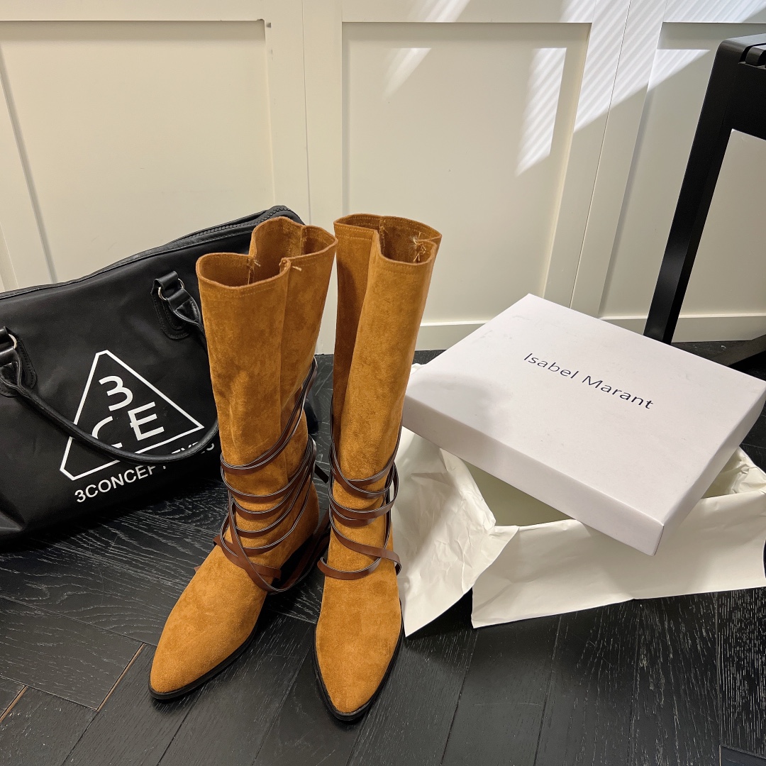 Isabel Marant strips style high knee boots