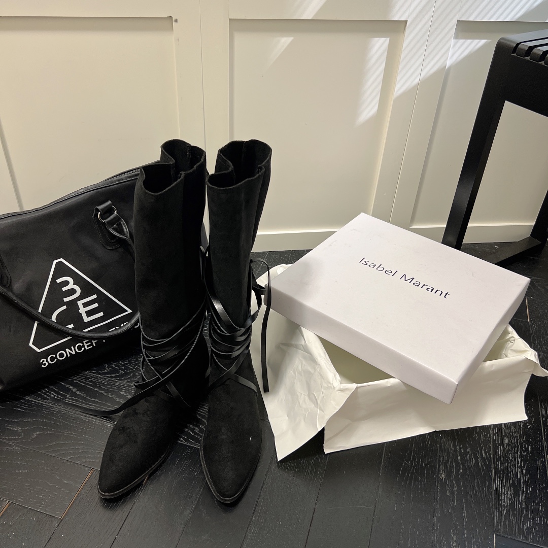 Isabel Marant strips style high knee boots