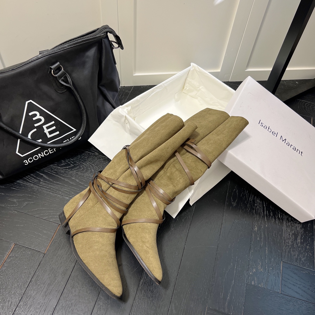 Isabel Marant strips style high knee boots