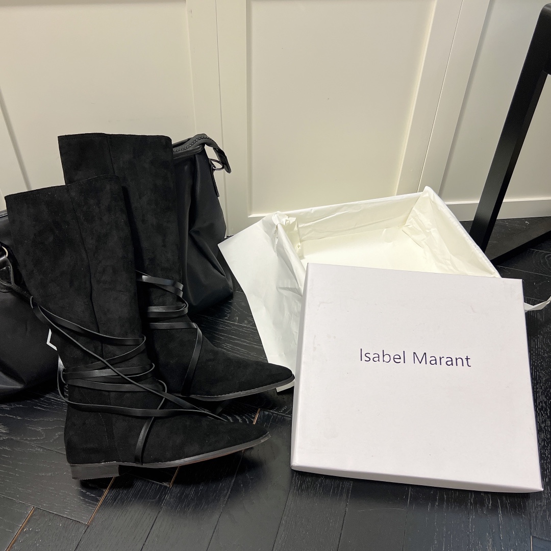 Isabel Marant strips style high knee boots