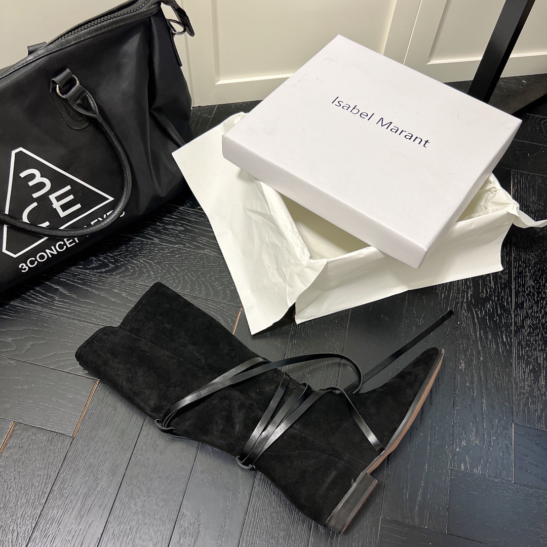 Isabel Marant strips style high knee boots