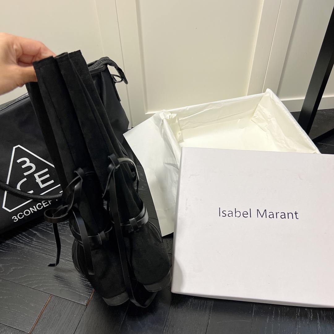 Isabel Marant strips style high knee boots