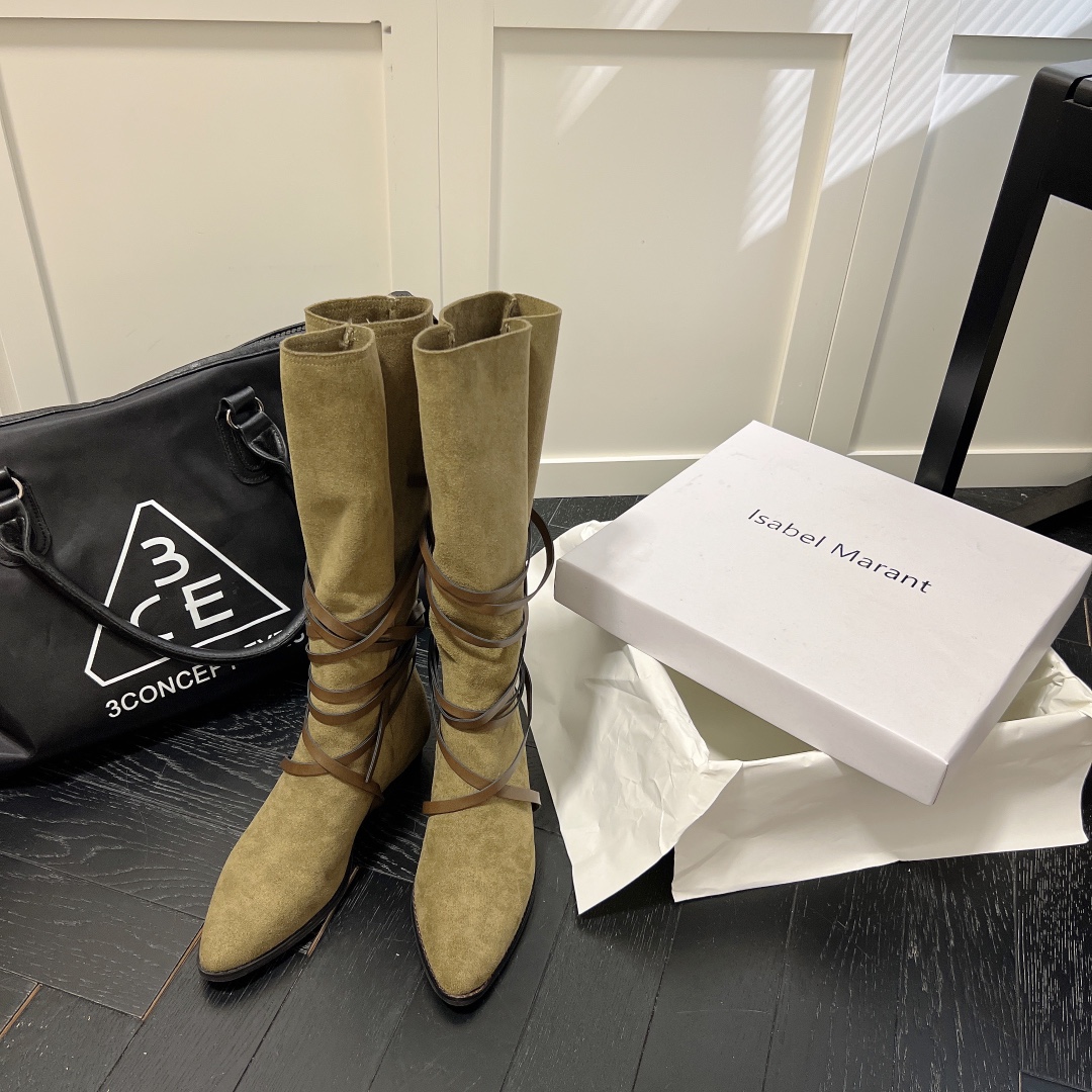 Isabel Marant strips style high knee boots