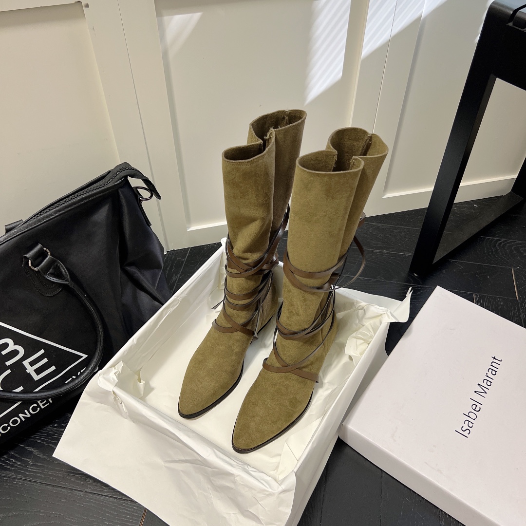 Isabel Marant strips style high knee boots