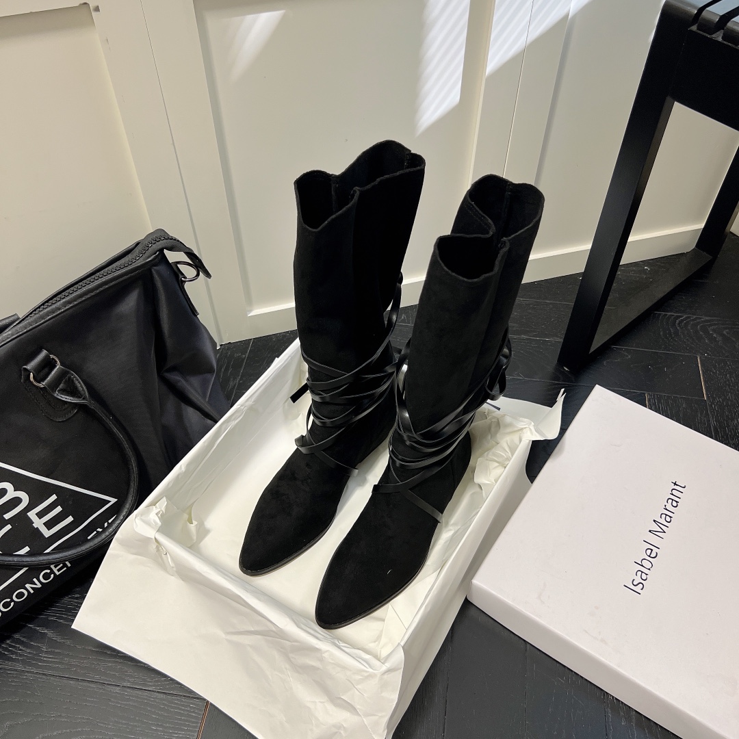 Isabel Marant strips style high knee boots