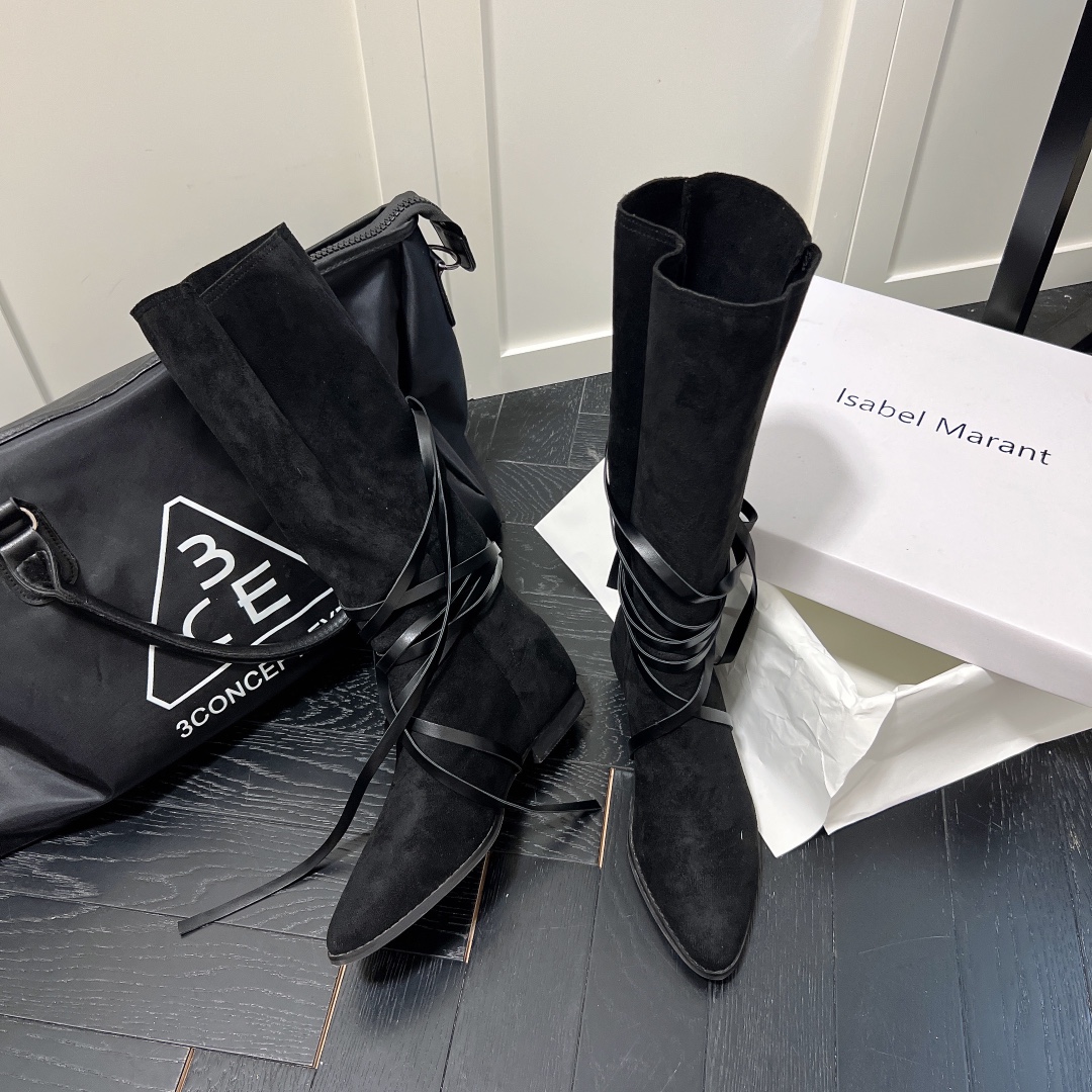 Isabel Marant strips style high knee boots