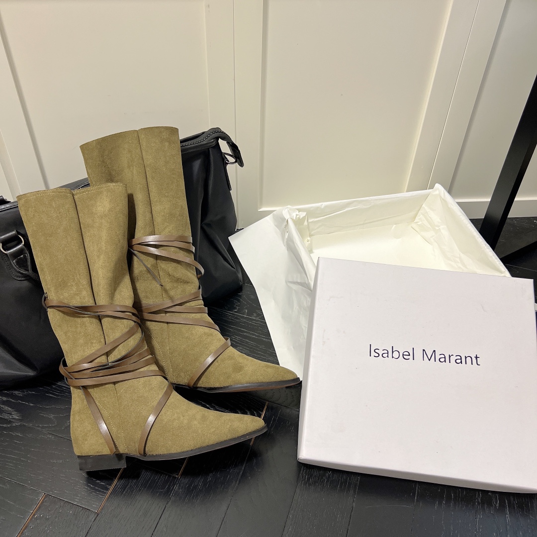Isabel Marant strips style high knee boots