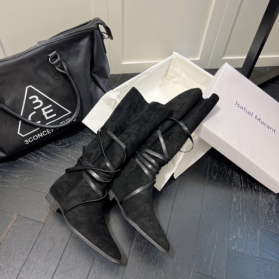 Isabel Marant strips style high knee boots